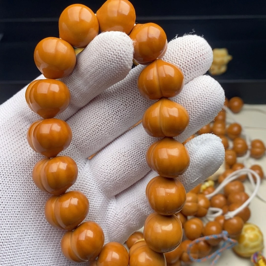 袁***生吊坠猴头核桃聚宝盆屁桃