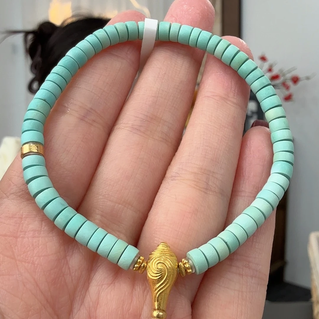 茶***茶绿松石18K金镶嵌珠宝奇石