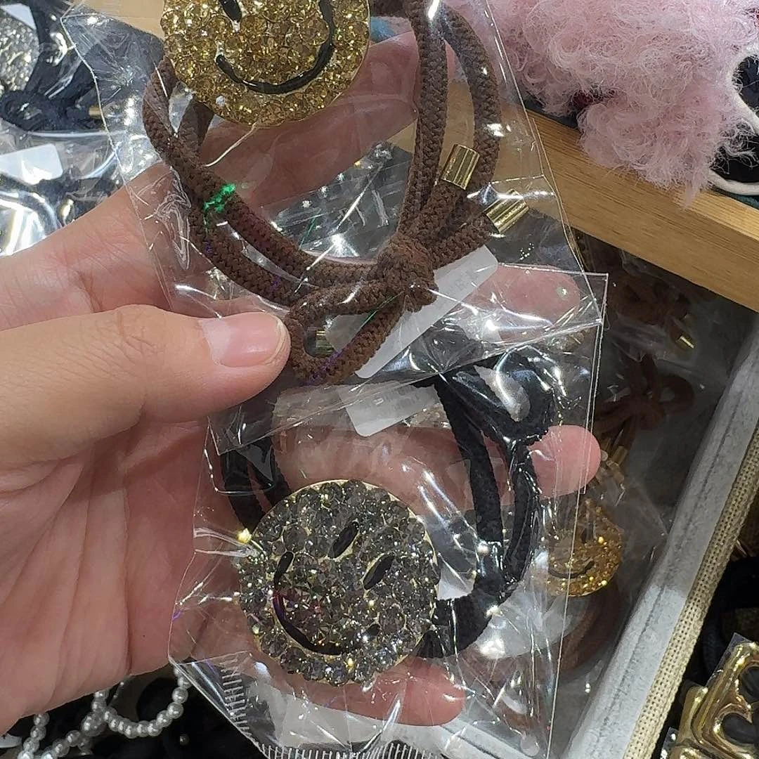 非金属两个笑脸头绳