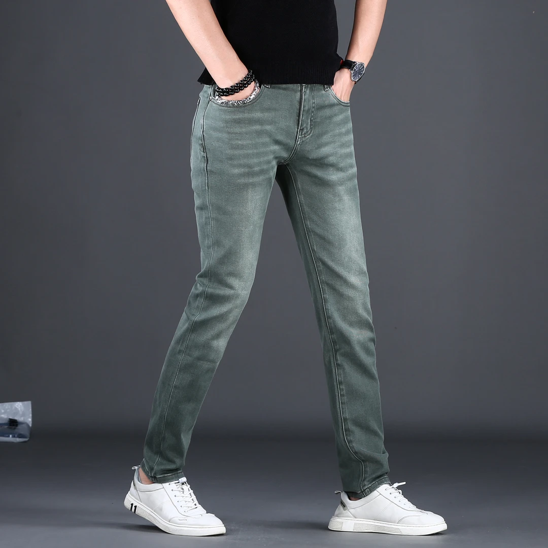 高档秋冬新款军绿色牛仔裤男款修身小脚休闲潮牌爆款欧货长裤男装