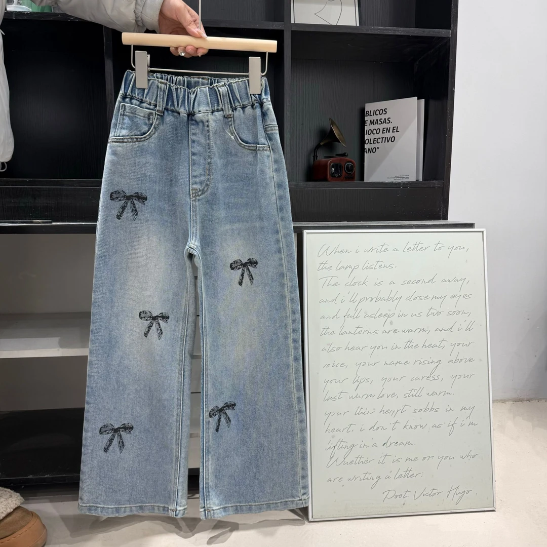 C003春秋女中大童黑色蝴蝶结牛仔裤