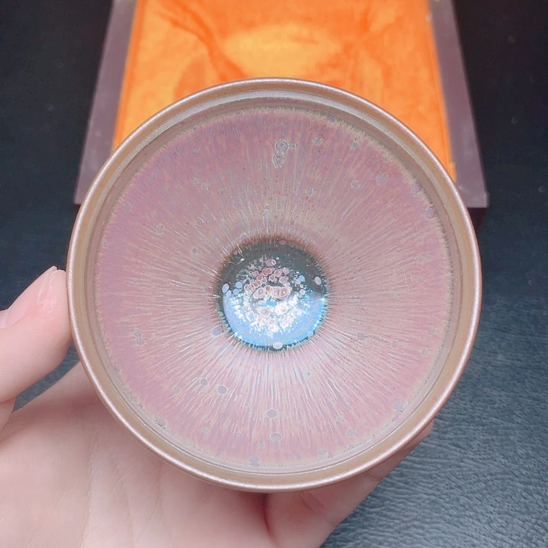 茶盏滴滴答答的声音响