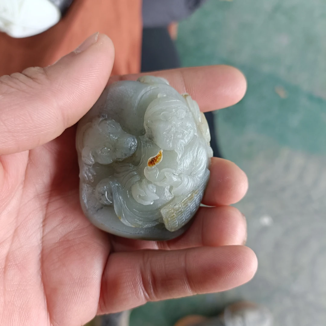 和田手把件寓意地主