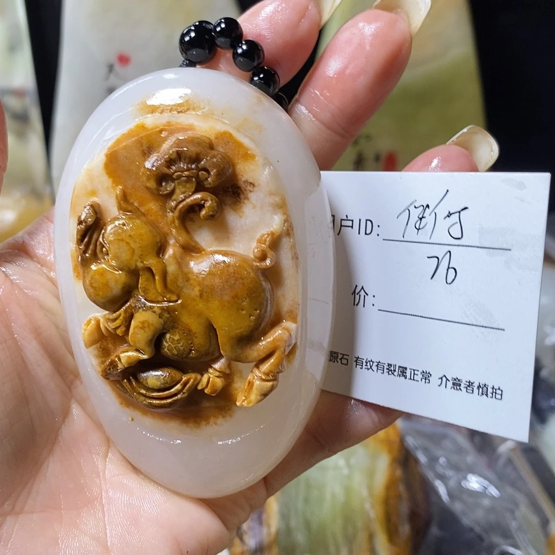 石材伴**行古青石手把件