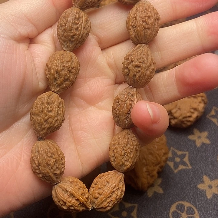 文玩核桃把件纯野生秋子手串