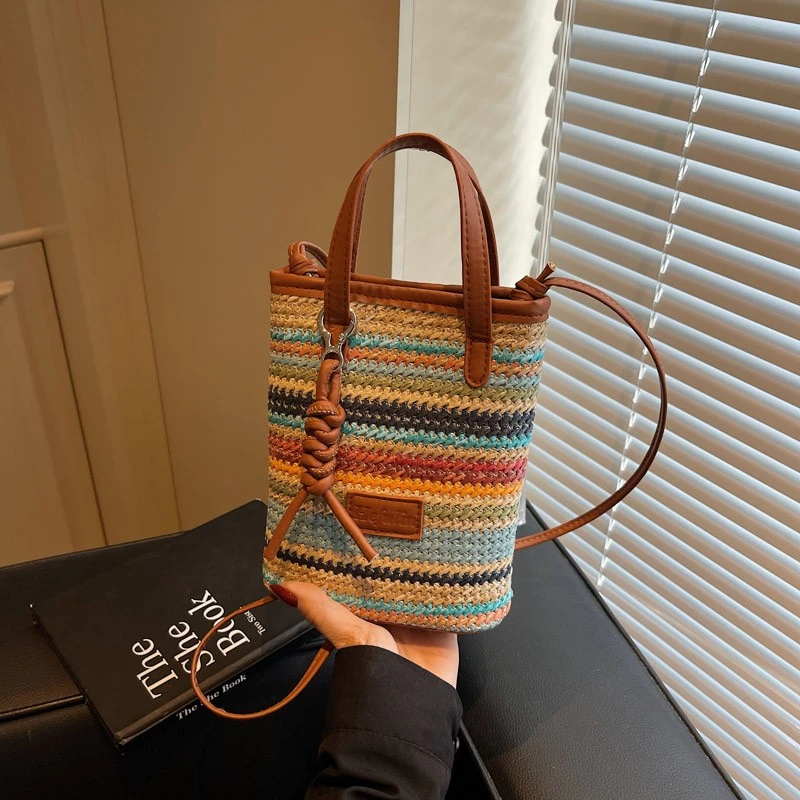 彩虹编织包斜挎新款时尚单肩包网红休闲百搭镂空编织包包夏季沙滩