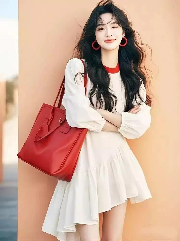 白色拼接不规则下摆连衣裙女2025春季新款富家千金高级感显瘦裙子