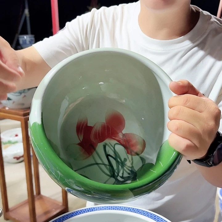 瓷片直径23厘米高度13厘米…………