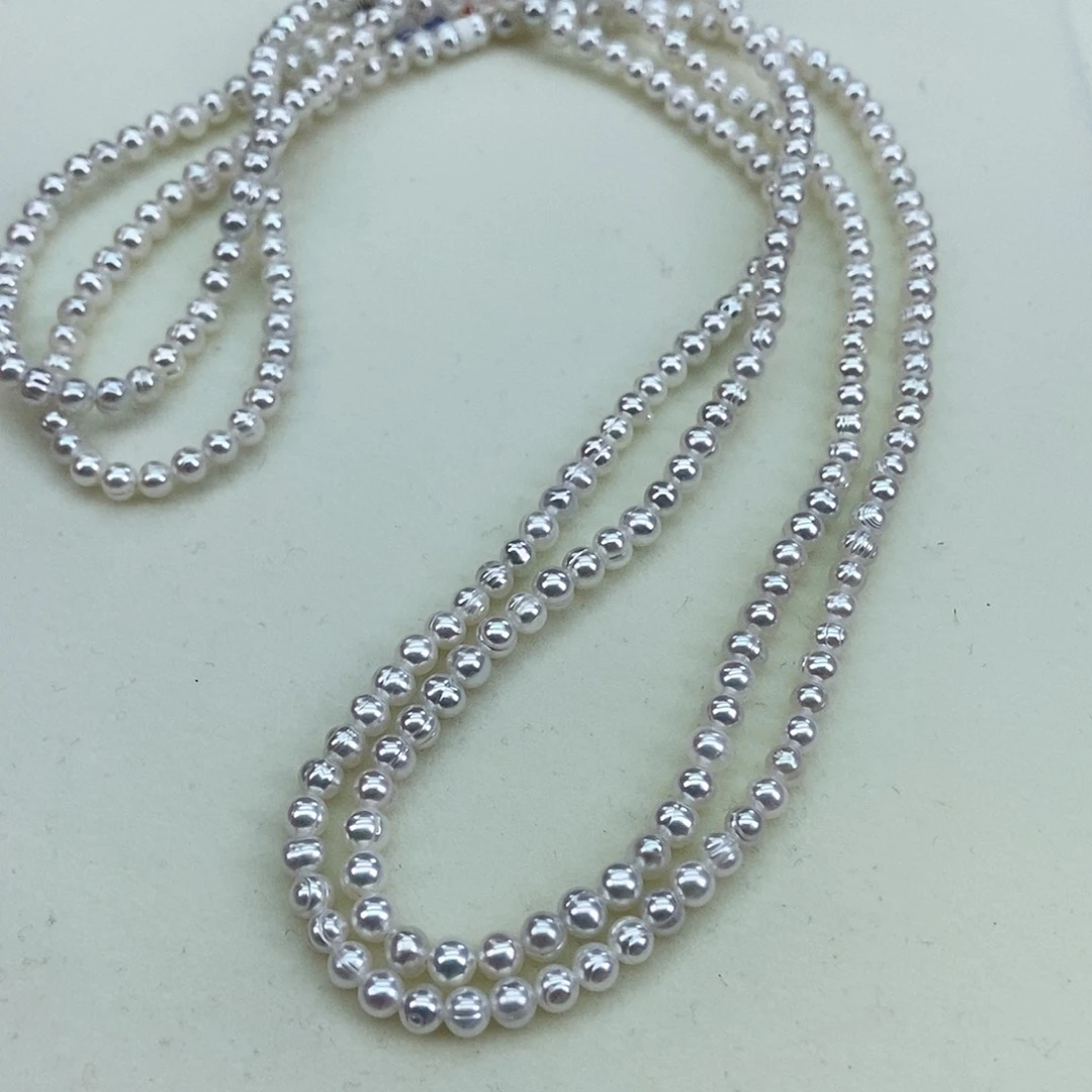 淡水珍珠4-5极光白透粉炫彩微瑕120cm未镶嵌