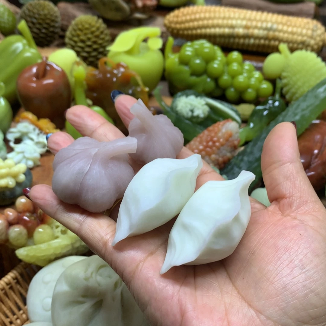 蛇纹石玉手把件未镶嵌快**光