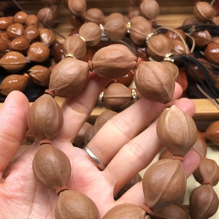 爱****橄榄核手串梅林铁核20 X28不退不换