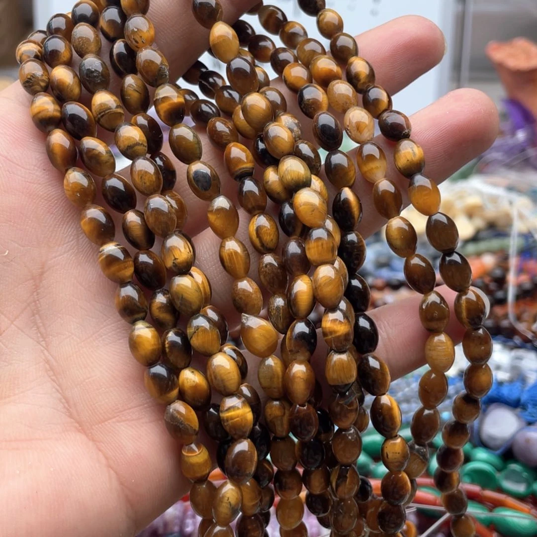 玛瑙/玉髓未镶嵌珠宝半成品一条装6*8mm虎眼米珠
