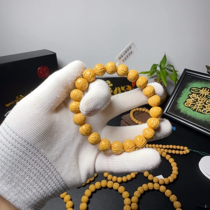 旭***东桃核手串野生桃核精品手串