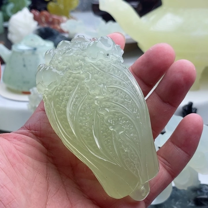 岫玉四大名玉手把件合金