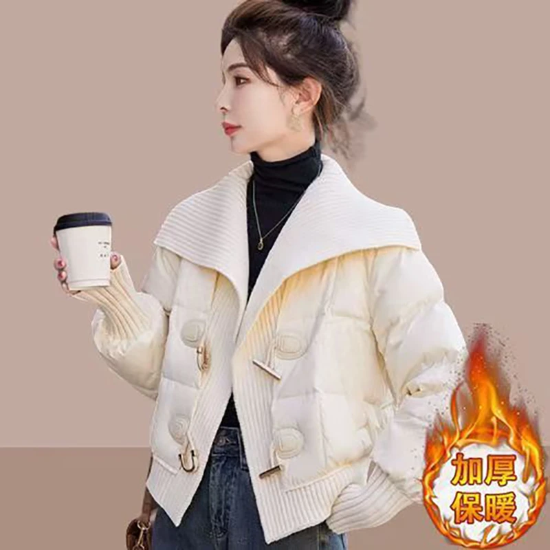 2025冬新款假两件拼接针织派克棉服设计感荷叶领牛角扣短款棉衣女