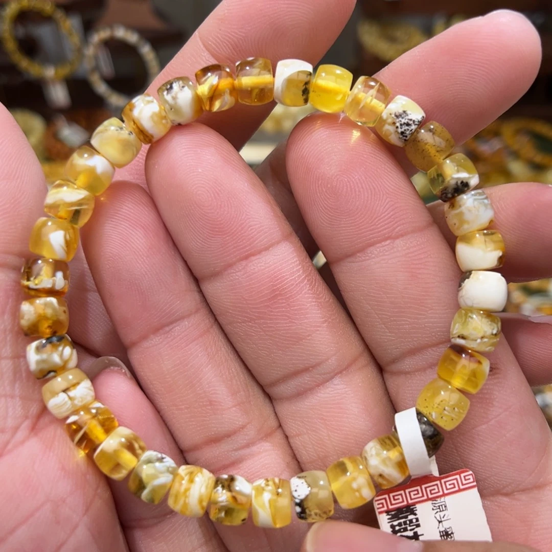 蜜蜡未镶嵌裸石有瑕疵00006.8mm