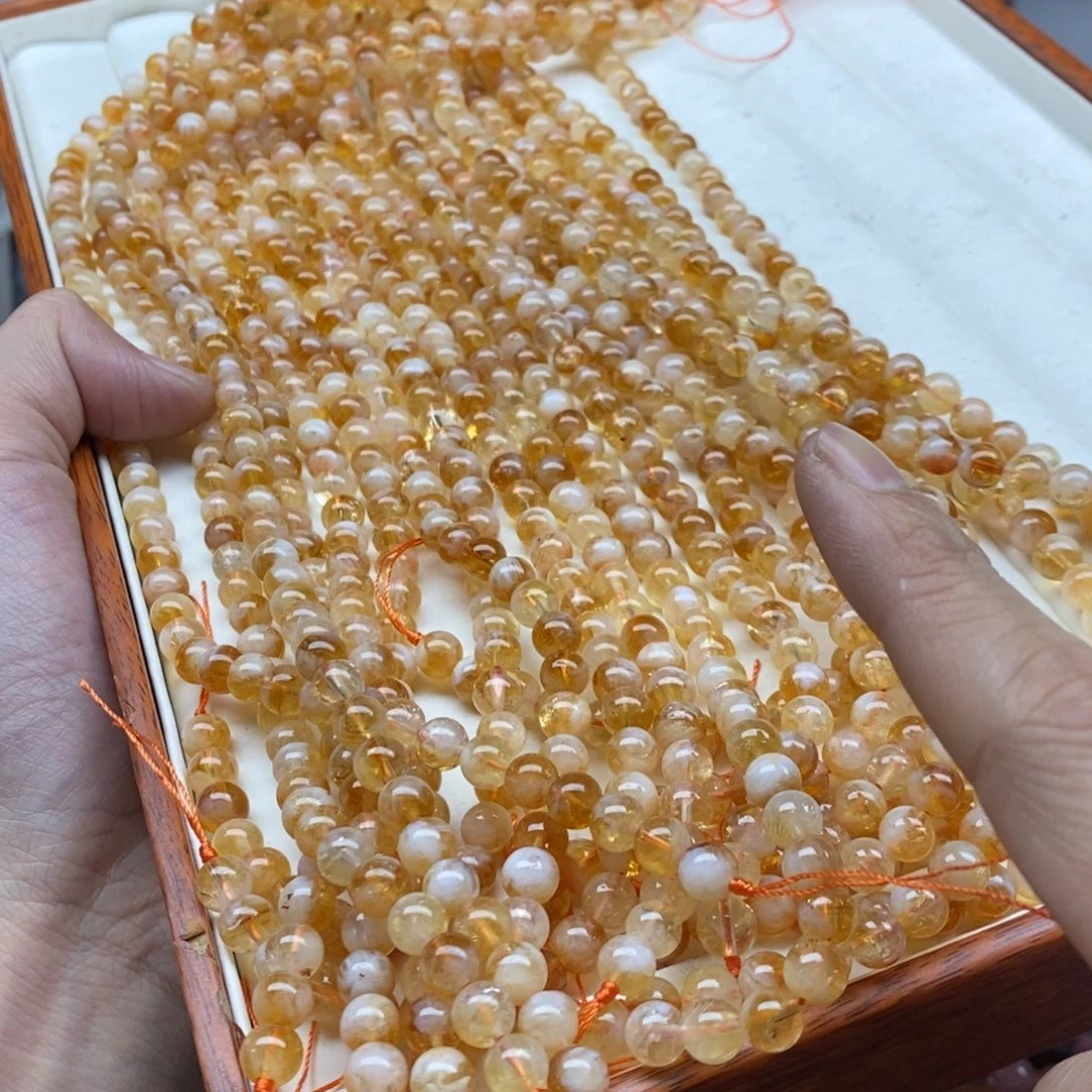 玛瑙/玉髓未镶嵌珠宝半成品一条天然6.7mm黄塔晶A级