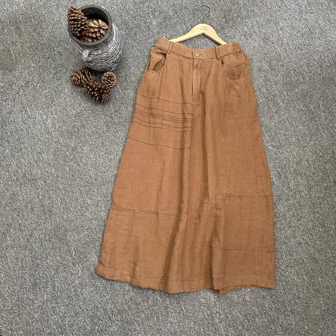 文艺亚麻创意绣线拼接松紧腰系扣半身裙夏季新款百搭显瘦麻料长裙