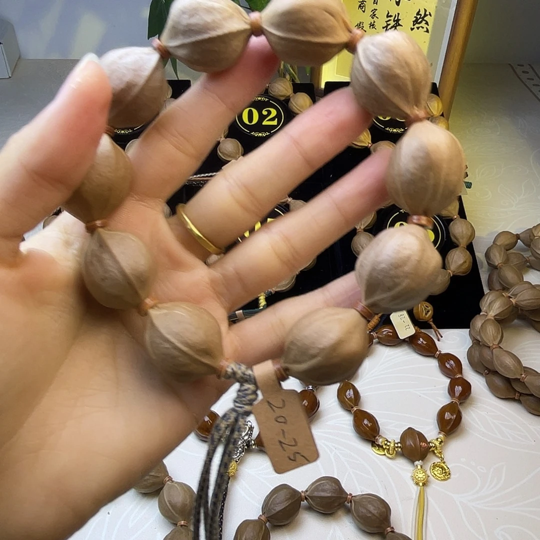 杰***.手串橄榄核梅林铁核20*25