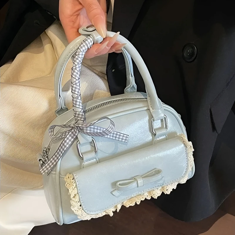 夏季超火小众蝴蝶结包包女2025新款HR百搭斜挎高级感手提保龄球包