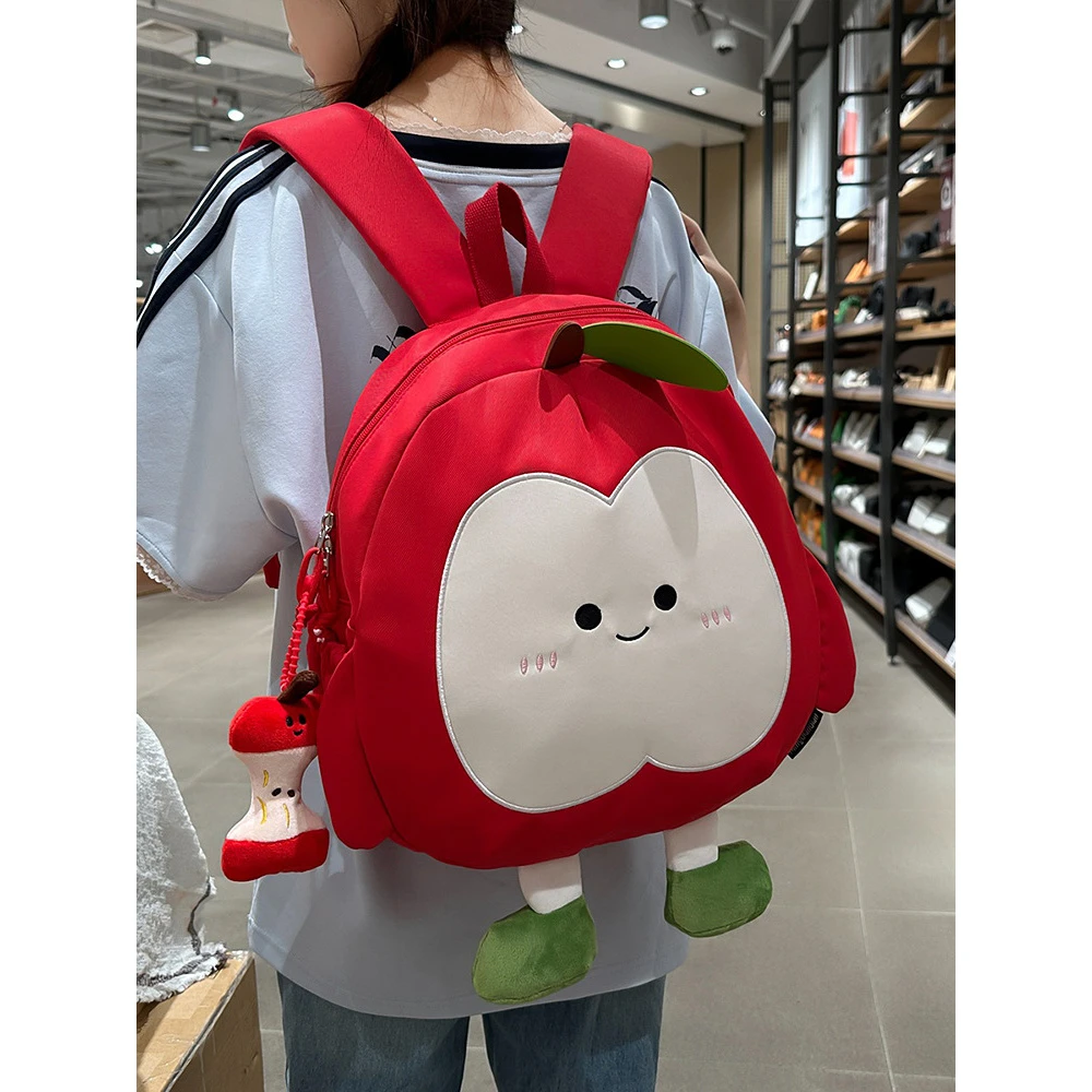 森系可爱苹果双肩包卡通大容量学生玩偶书包洋气少女旅行休闲背包