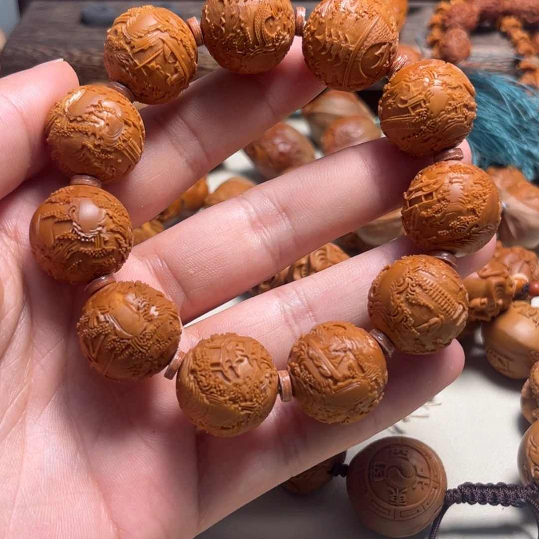 橄榄核吊坠o****o景秀山河