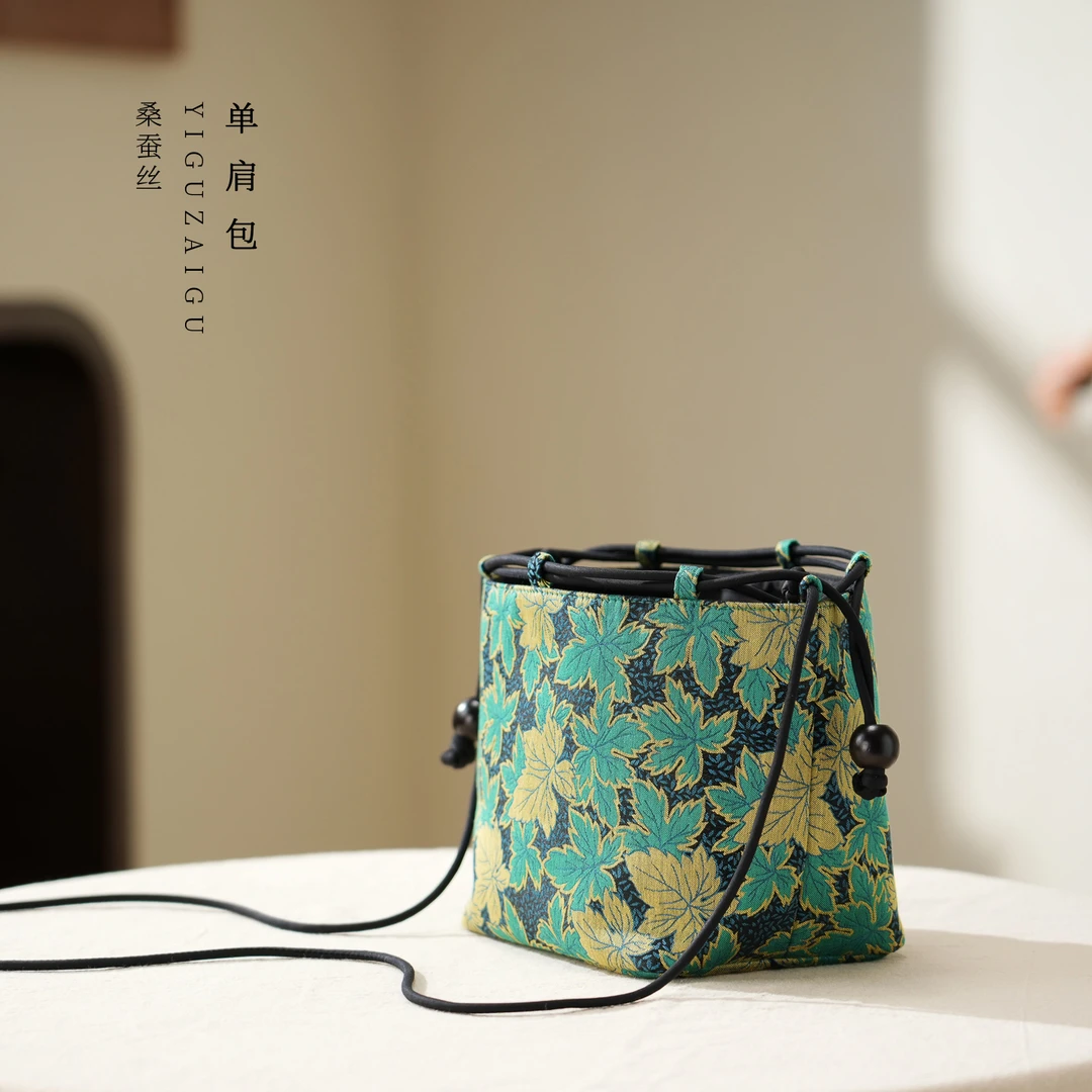 单肩包/一顾再顾单肩斜挎包水桶包