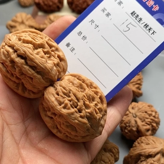 文玩核桃吊坠平谷九龙