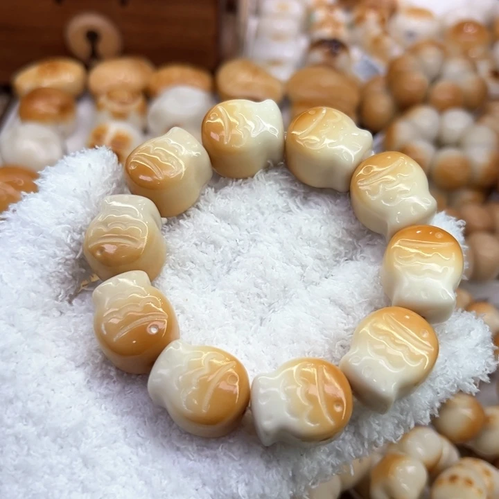 手串菩提根/象牙果76 象牙果原果雕刻炭烧渐变小鱼瑕