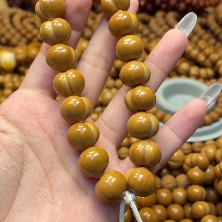 胖***咪核桃微瑕亮面屁桃手持