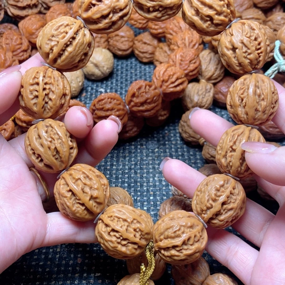 吊坠桃核粗筋麻花手串