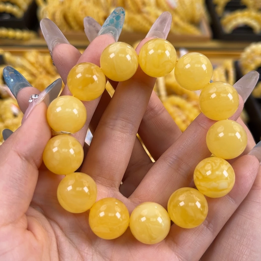 裸石琥珀未镶嵌鸡油黄满蜜妖花