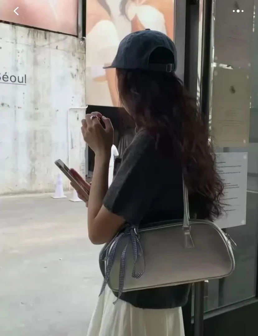东大门25新~春季新款芭蕾风手提女包潮百搭银色单肩腋下包