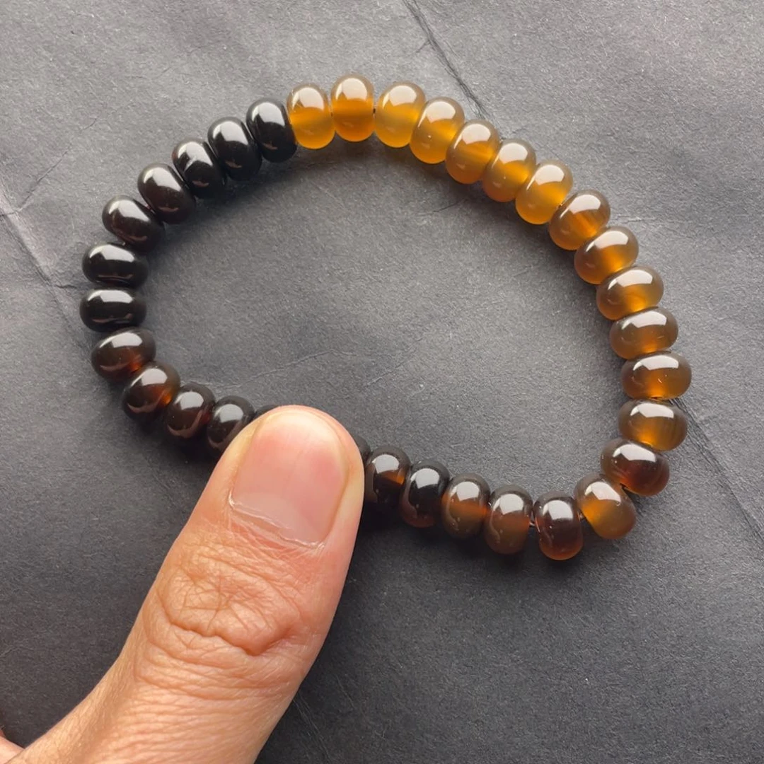 石英质玉黄蜡石树化手串未镶嵌光*?