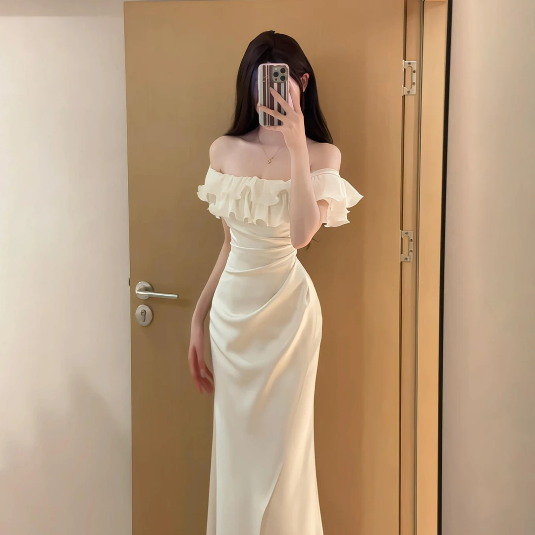 法式白色露肩连衣裙子女夏季2025新款一字肩黑色长款修身连衣裙