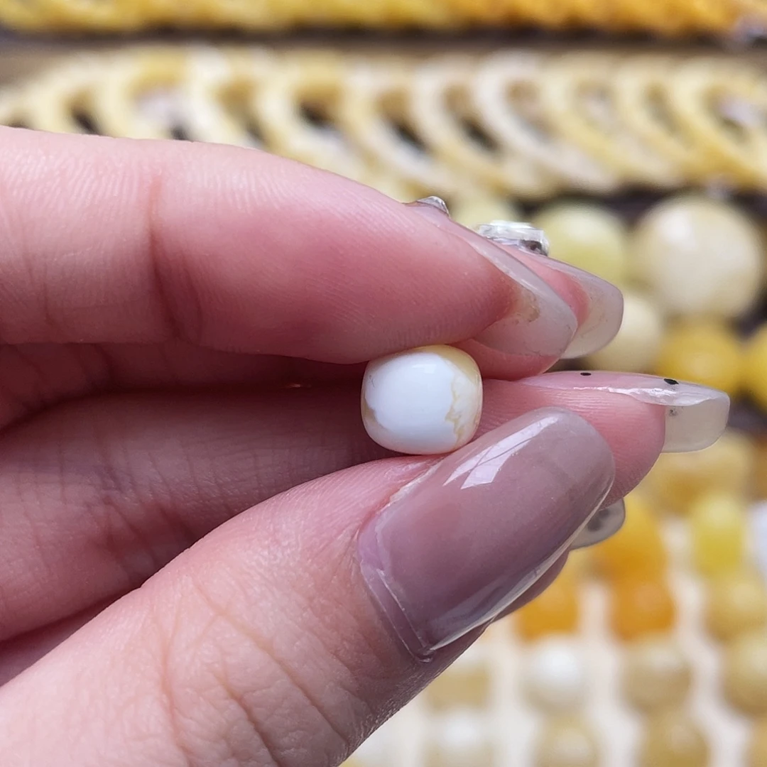 琥珀未镶嵌裸石8.3*7.3mm老型瑕