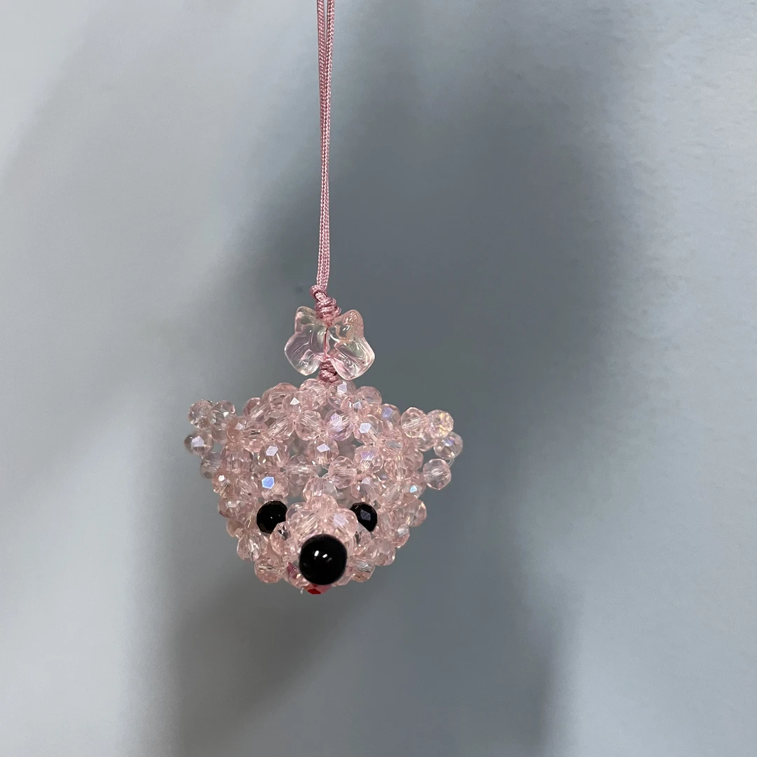 编织绳款粉色熊头手机坠E804