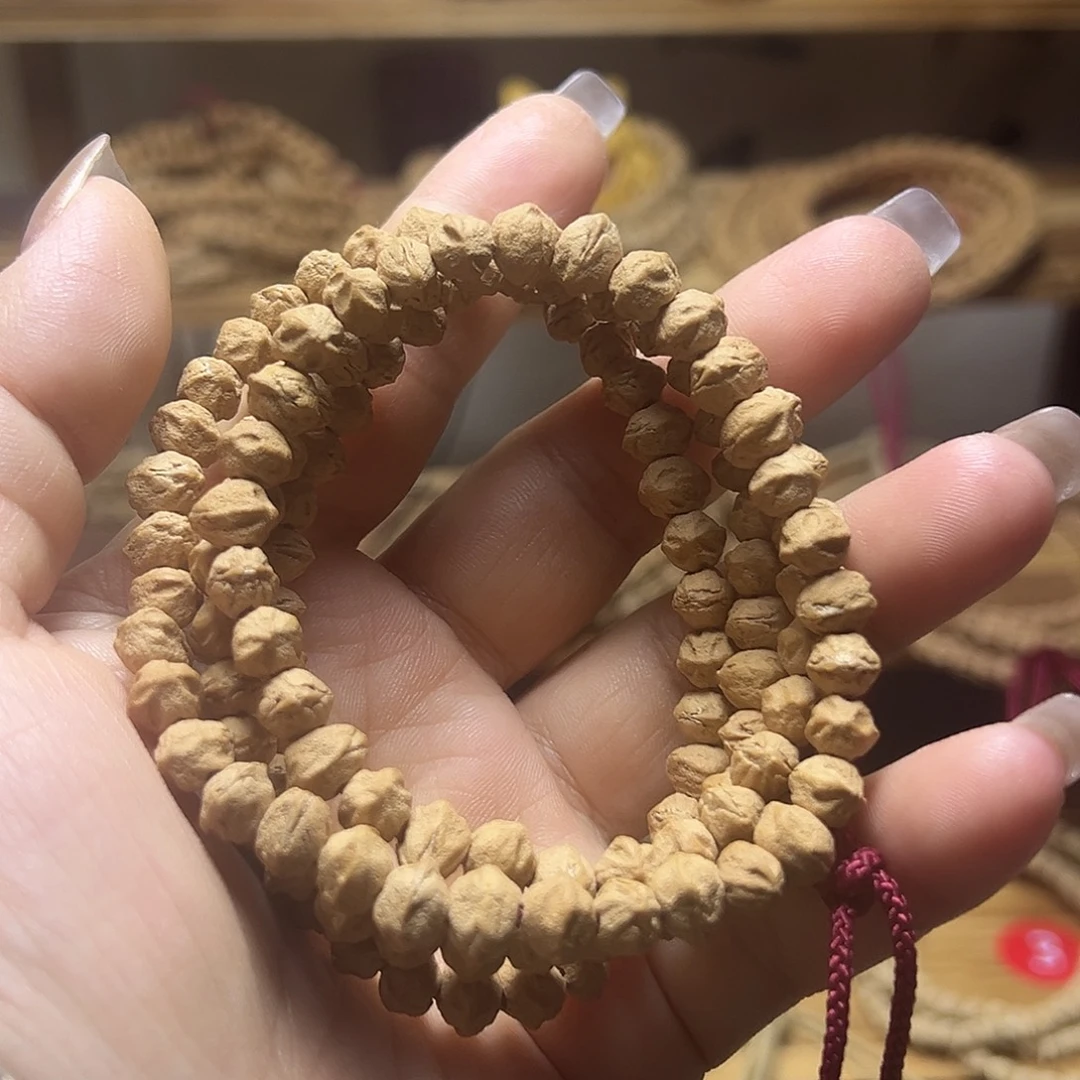 柏香籽/百香籽吊坠媚眼7