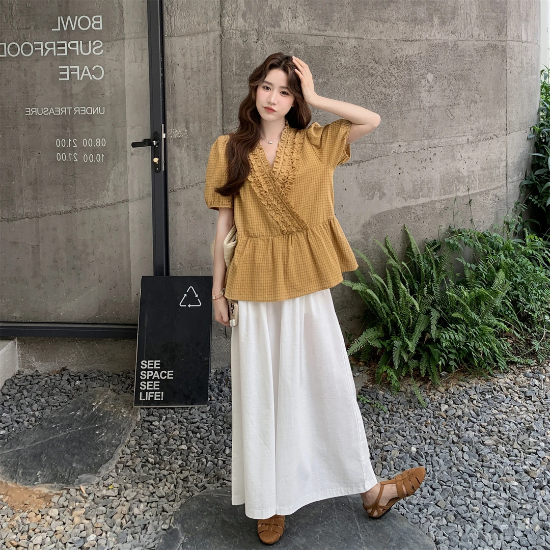 氛围感格子衬衫阔腿裤套装女2025夏季新款度假风百搭显瘦两件套