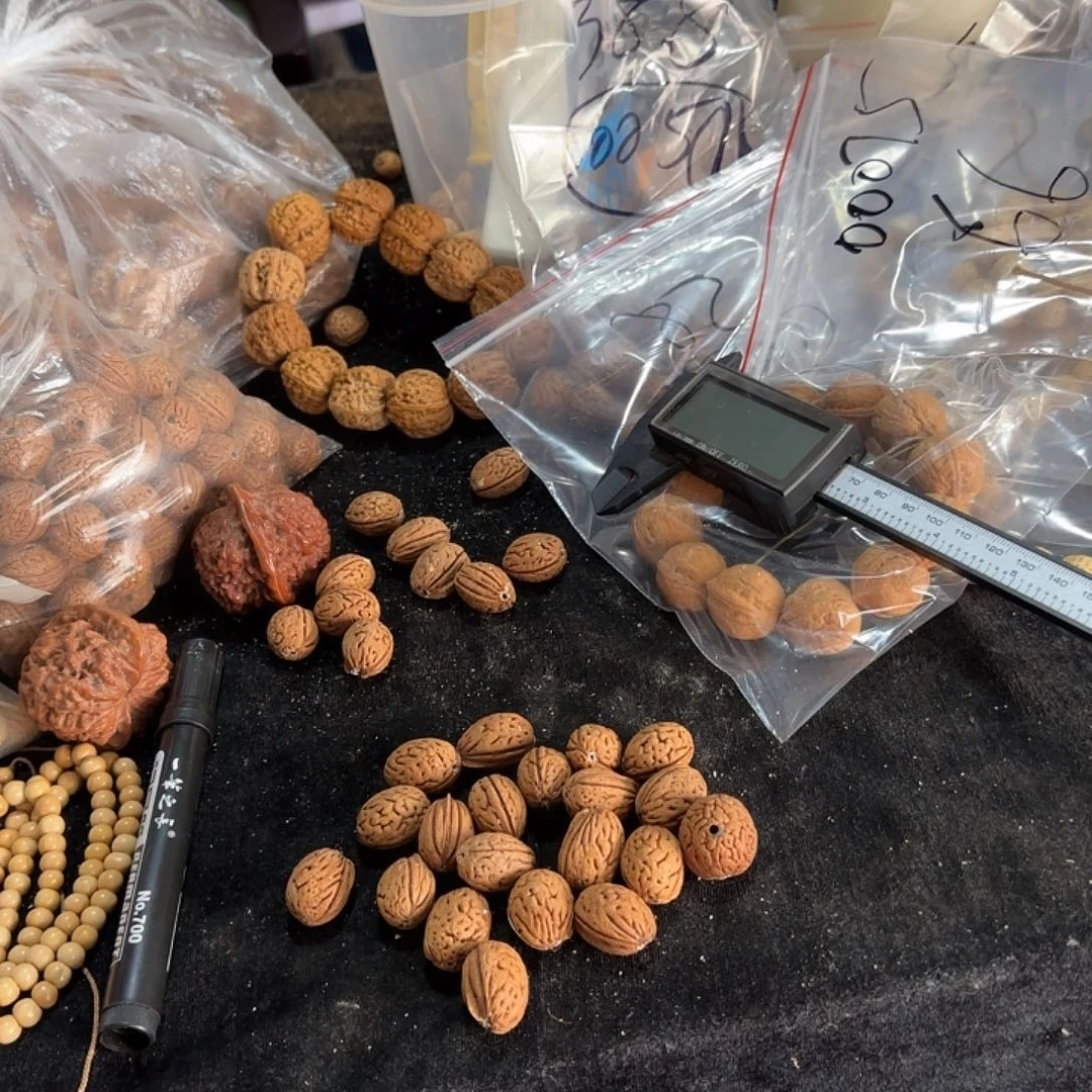 越****.00090野生桃核盘锦桃核钱袋子手持