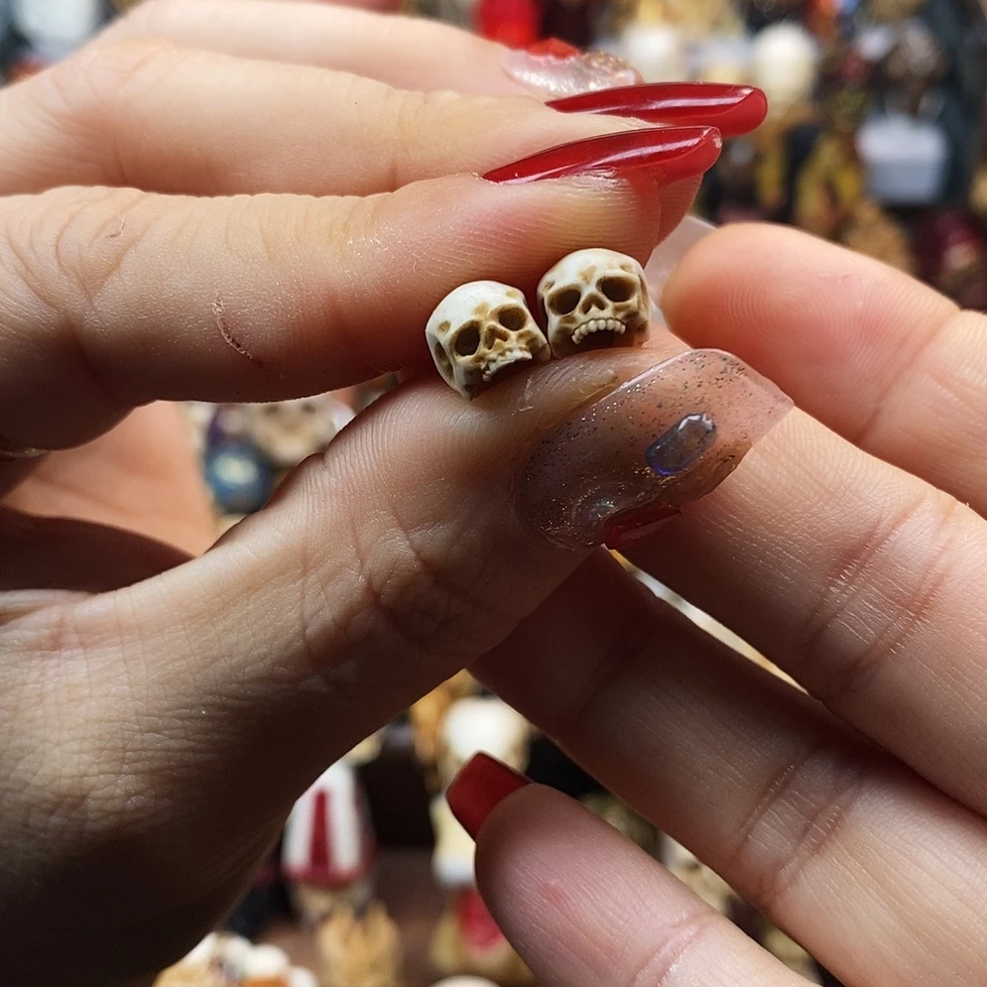 橄榄核吊坠宝宝骷髅一对啊啊啊