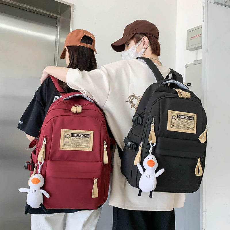 新款书包女大学生高中生中学生少女双肩包简约减负大初中生书包