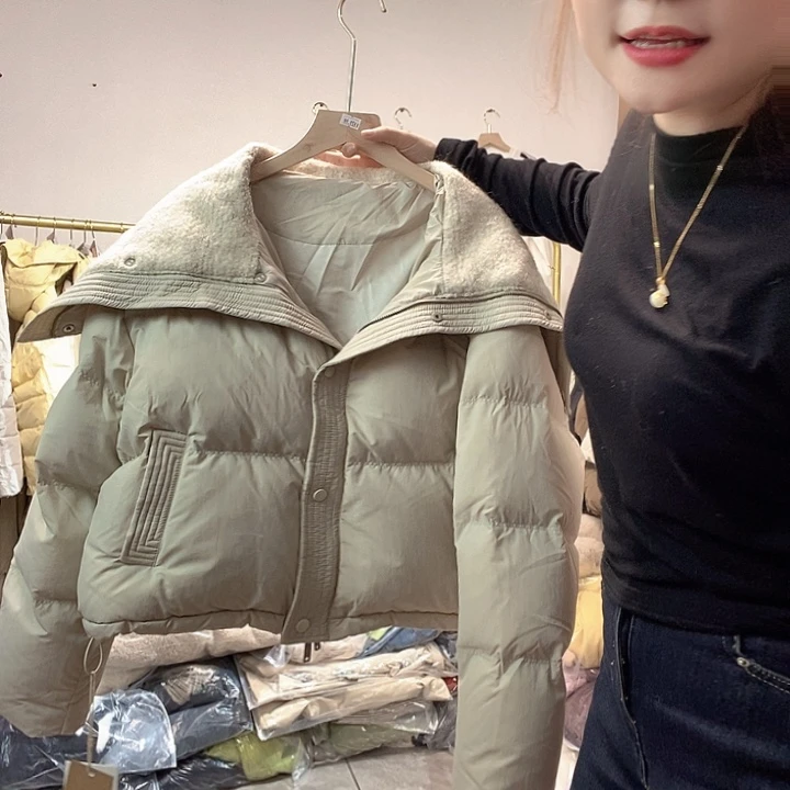 女款羽羽外套女米白
