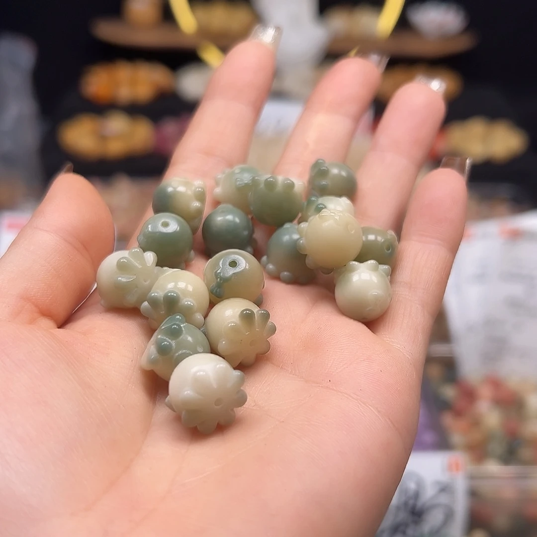 手串菩提根/象牙果飘绿章鱼25颗