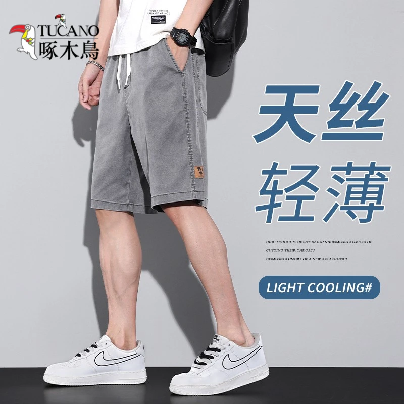 啄木鸟夏季莱赛尔天丝五分牛仔短裤宽松直筒男士2025薄款休闲中裤