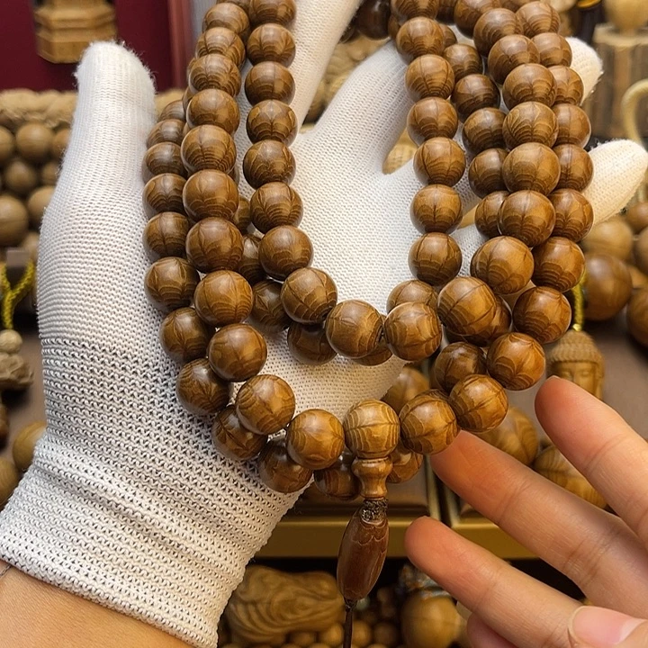 淘***蛋木质非金属六道木手串1.2