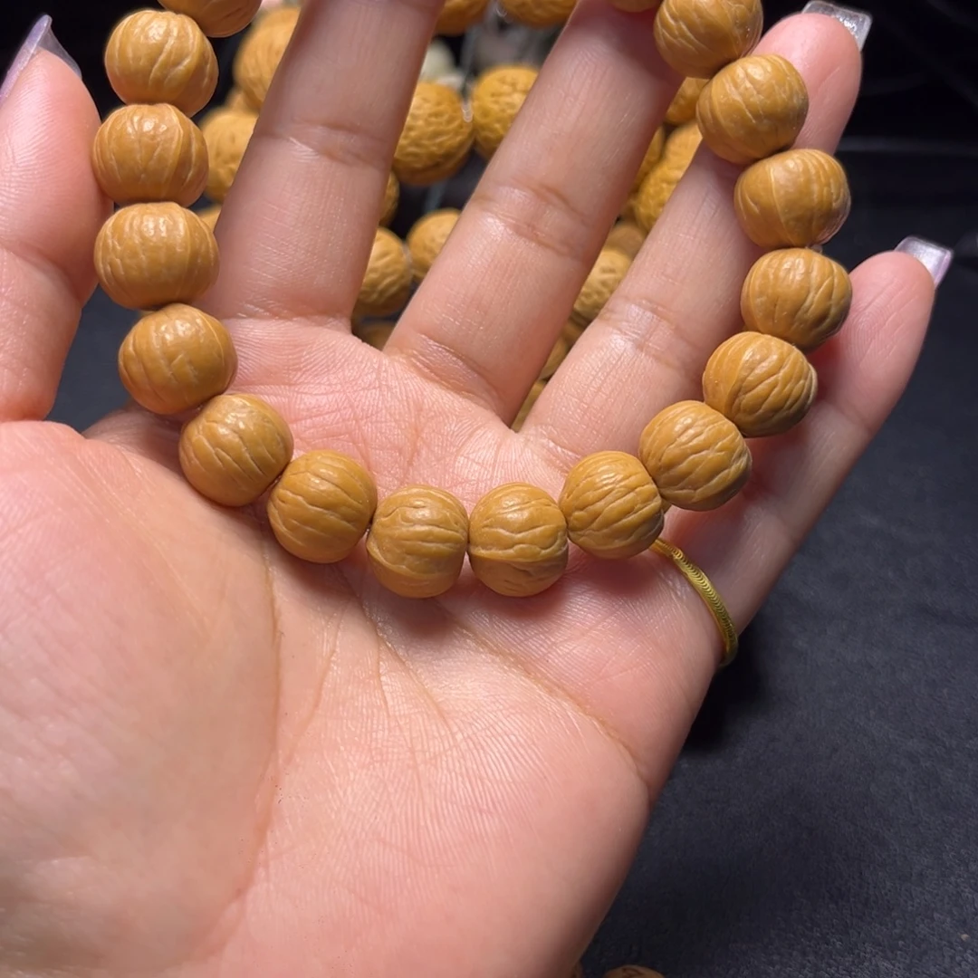 不***奶桃核吊坠13+猴头手串