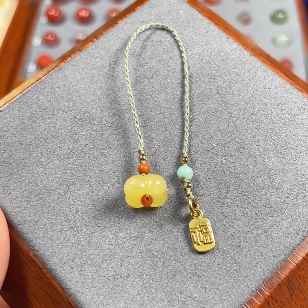 蜜蜡裸石未镶嵌桂花手机挂