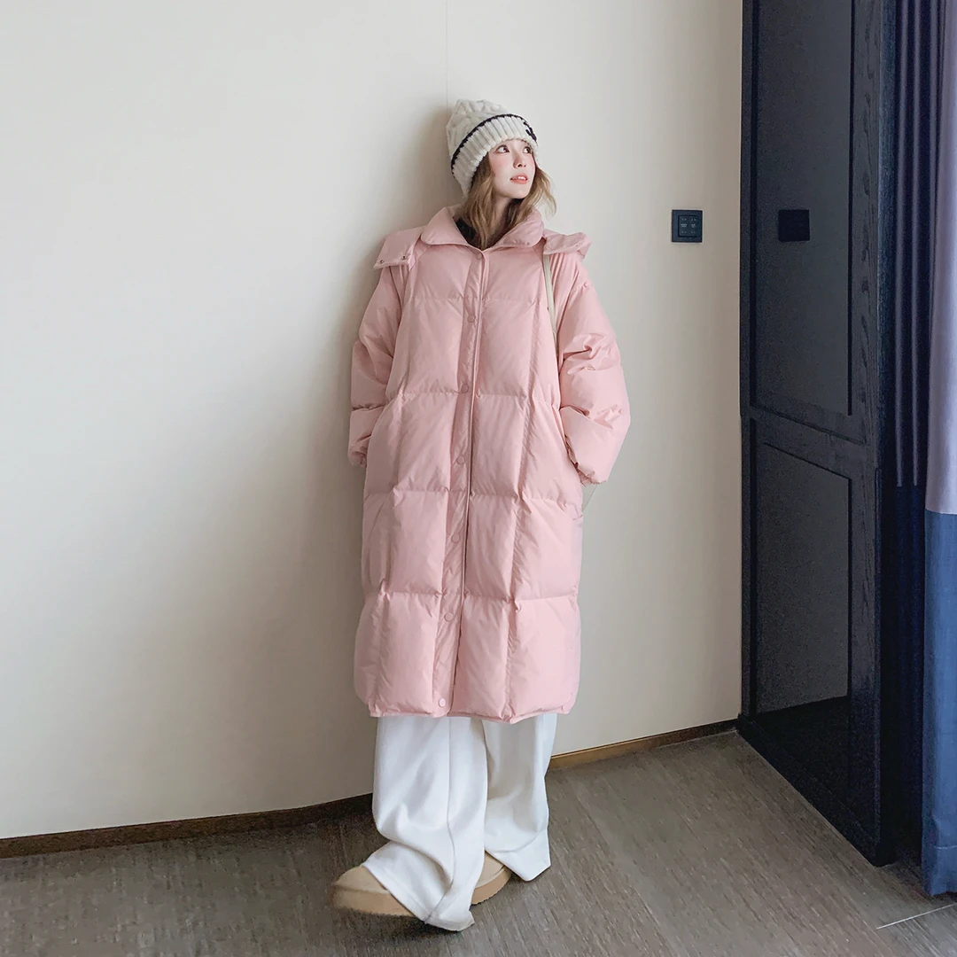 粉色连帽长款过膝羽绒服女冬2025新款时尚百搭白鸭绒保暖显瘦外套