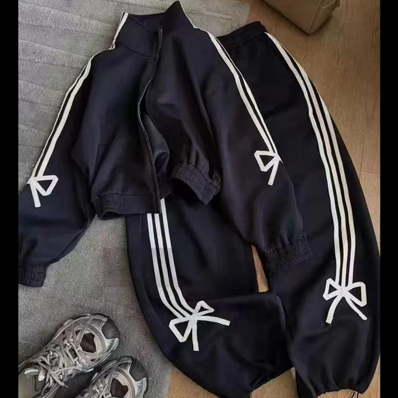 早秋穿搭套装2025新款女高级感独特超好看蝴蝶结藏青色休闲两件套